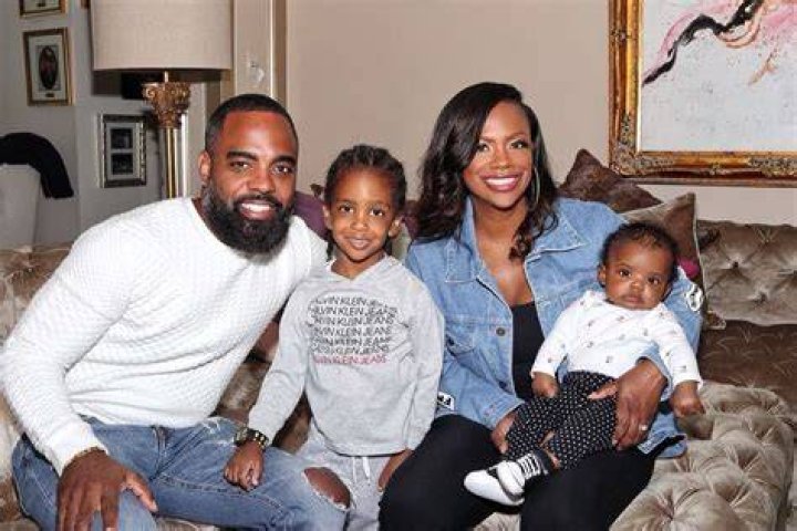 Kandi Burruss in a family picture with a daughter and two sons, with husband Todd.