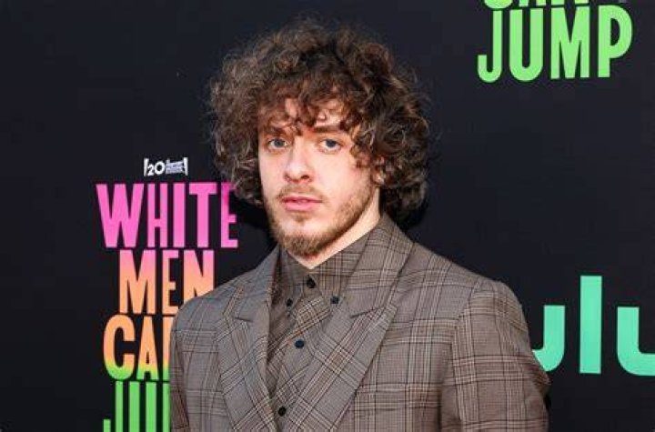 Unveiling The Intriguing World Of Jack Harlow's Iconic White Suit On A Couch